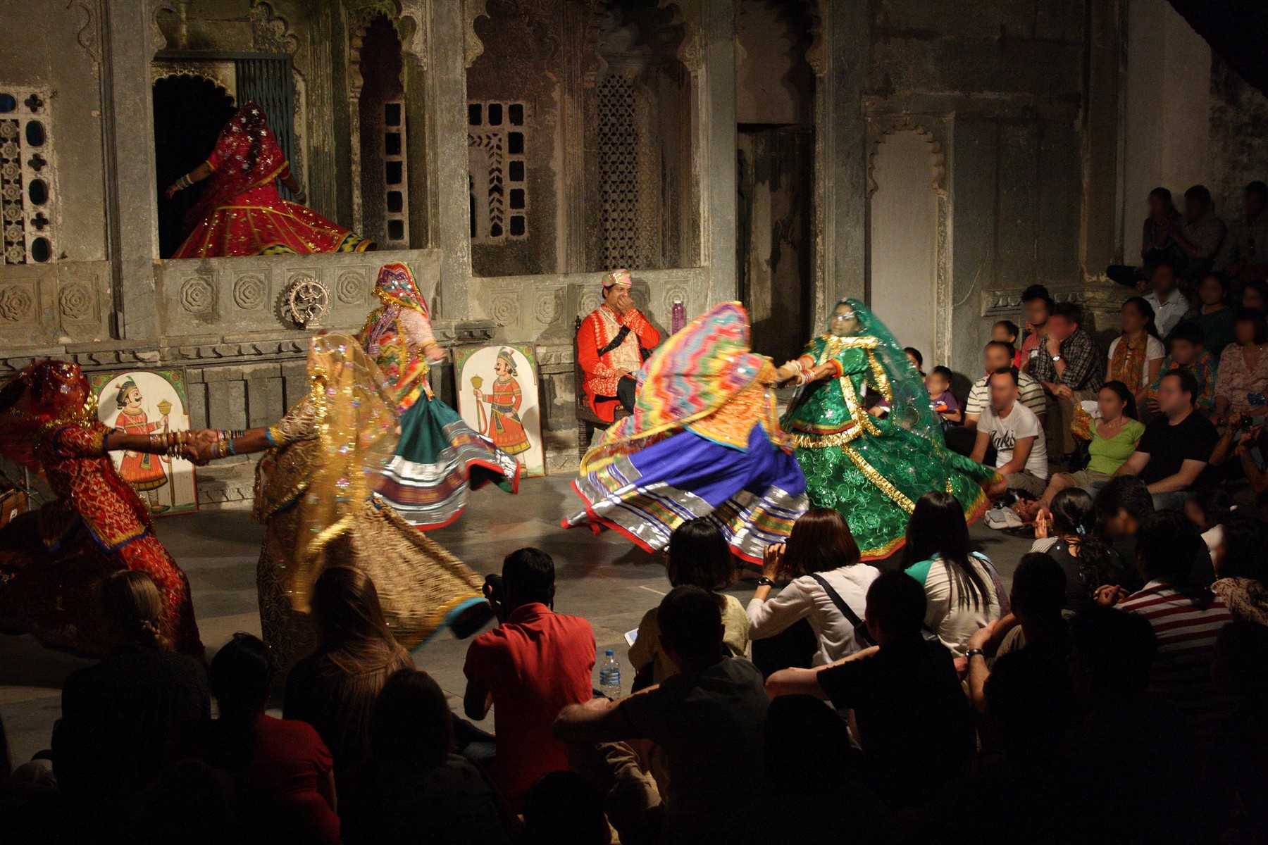 Ghoomar performers in colourful swirling skirts at Bagore ki Haveli, Udaipur